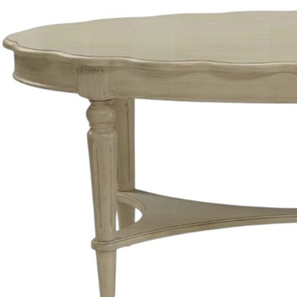 Antiqued White Solid Wood Oval Distressed Coffee Table - 50-inch