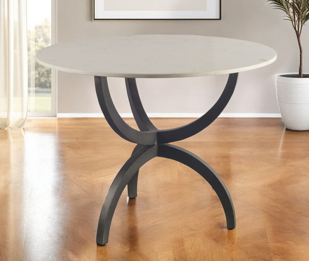Off White and Black Rounded Marble and Metal Three Leg Base Dining Table