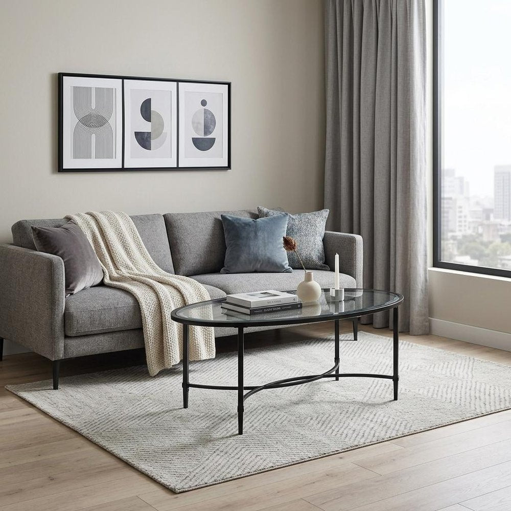Clear and Black Glass and Metal Oval Coffee Table - 45-inch