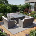 Seven Piece Gray Wicker Upholstered Cushions Sectional Seating Group with Fire Pit and Table