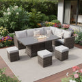 Eight Piece Gray Wicker Upholstered Cushions Sectional Seating Group with Fire Pit and Table