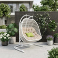 Beige and White Metal Indoor Outdoor Swing Chair with Beige Cushion