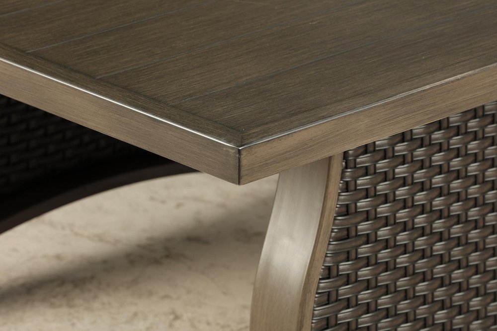 Two Piece Brown and Tan Metal Sectional Seating Group with Table