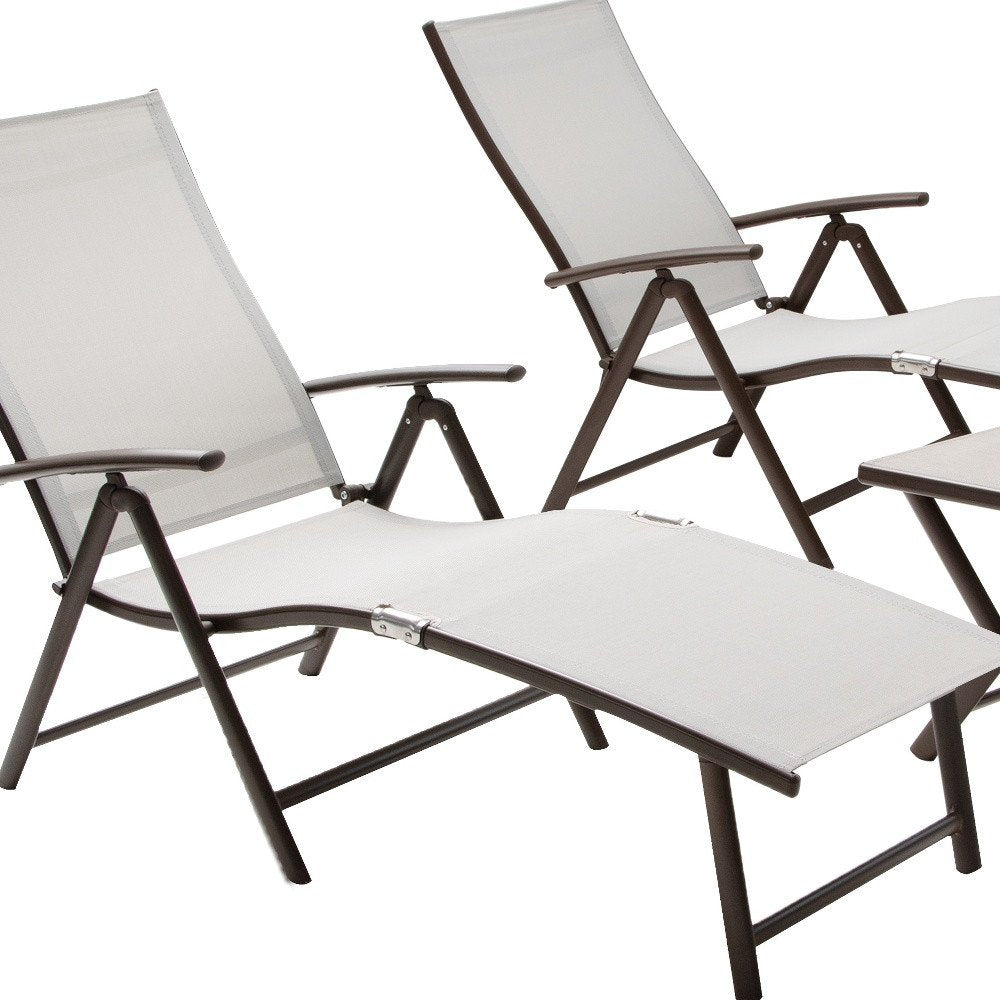 Set of Three Light Gray Steel Outdoor Folding Chaise Lounges