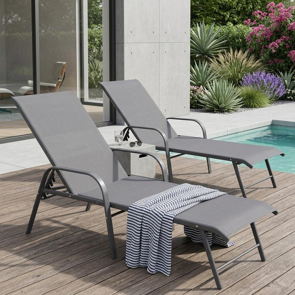 Set of Two Gray Steel Six Position Adjustable Outdoor Stacking Chaise Lounges
