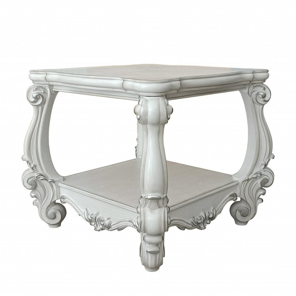 Antiqued White Manufactured Wood Square Scroll End Table with Shelf