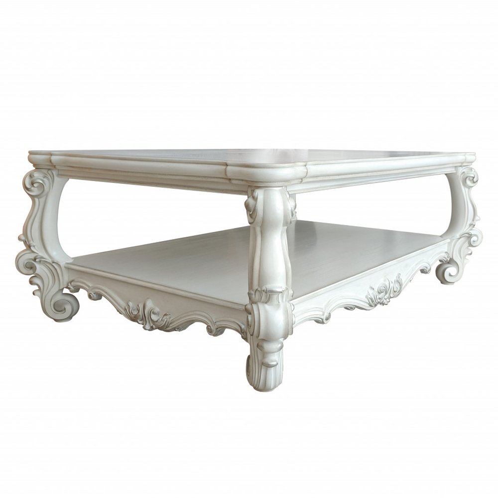 Antiqued White Wood Coffee Table with Shelf - 57-inch