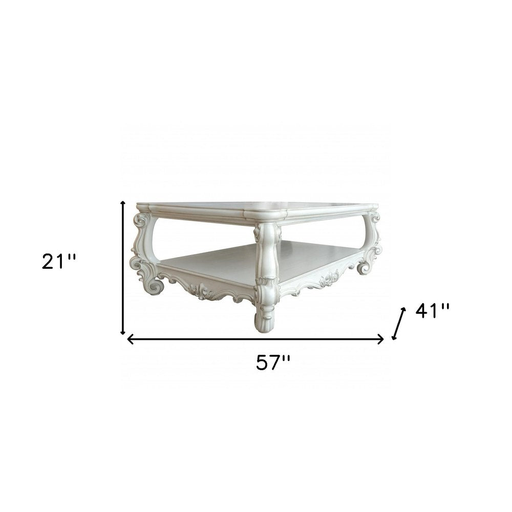 Antiqued White Wood Coffee Table with Shelf - 57-inch