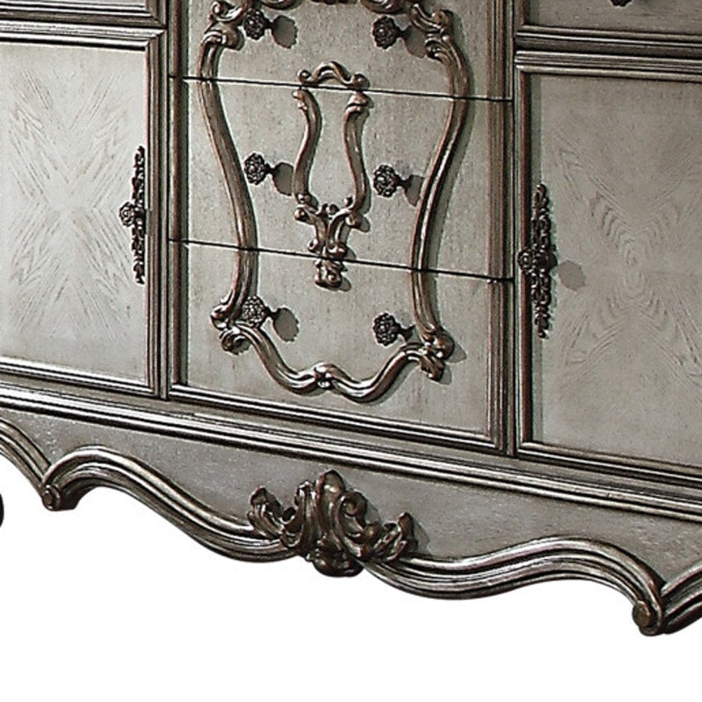 Platinum Carved Scrollwork Wood and Polyresin Five Drawer Triple Dresser