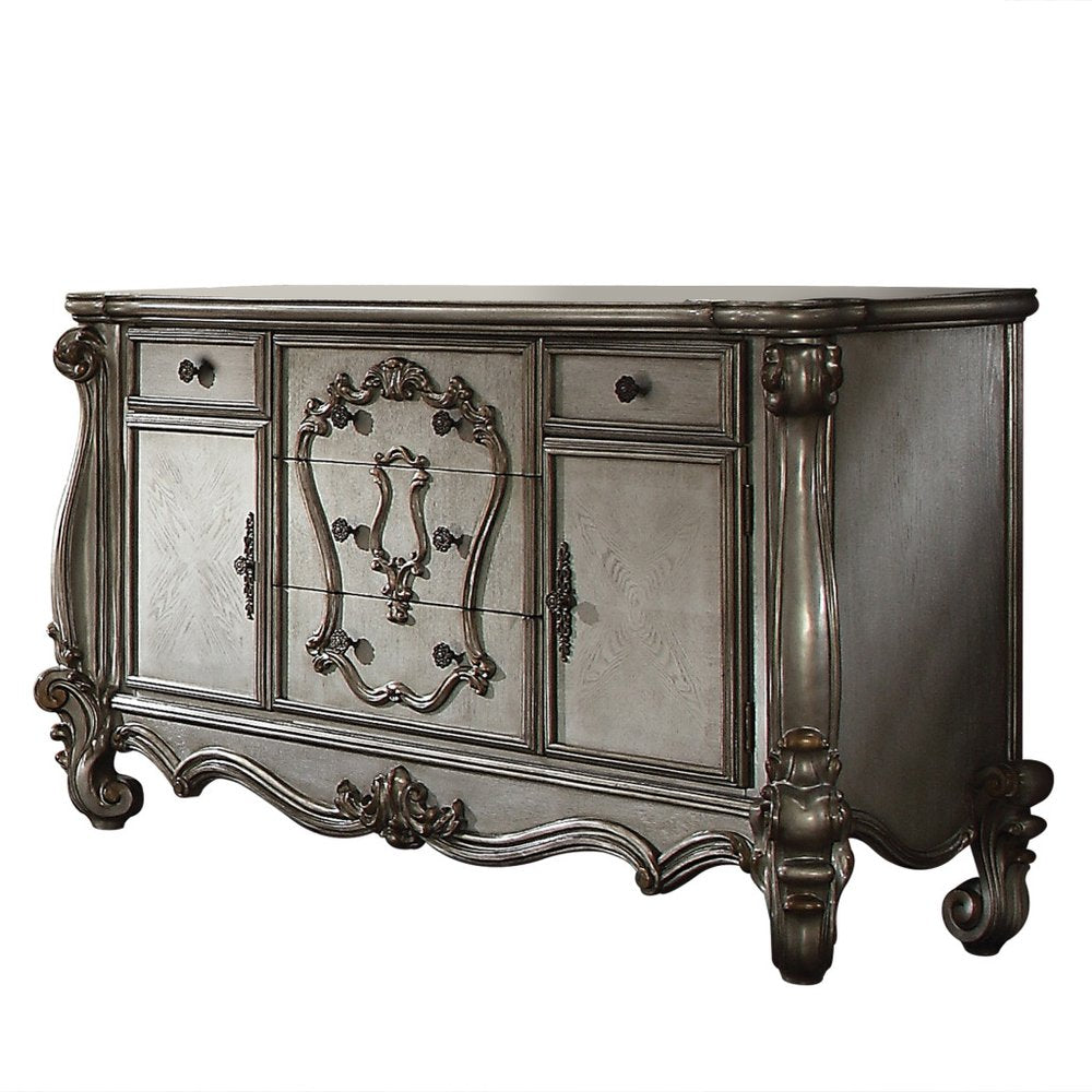 Platinum Carved Scrollwork Wood and Polyresin Five Drawer Triple Dresser
