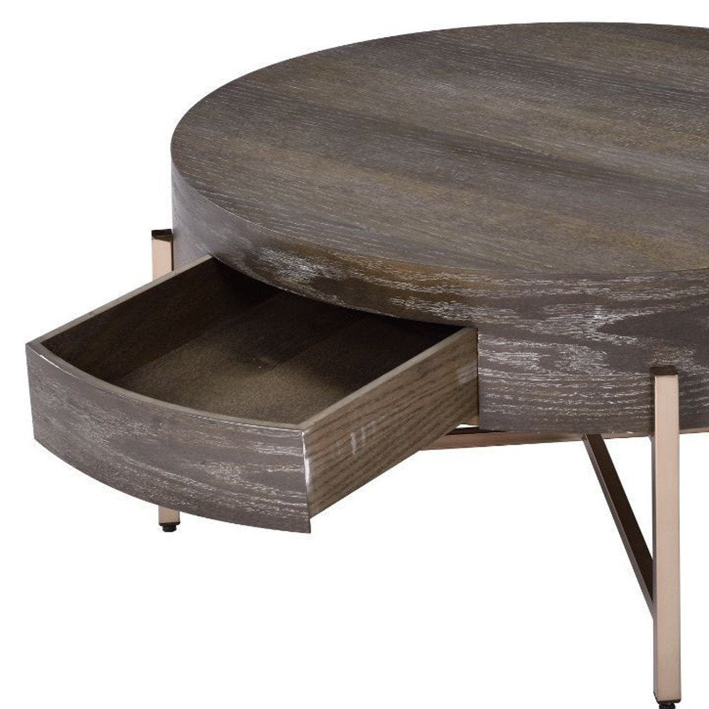 Dark Brown and Champagne Wood and Metal Round Sled Coffee Table with Drawer