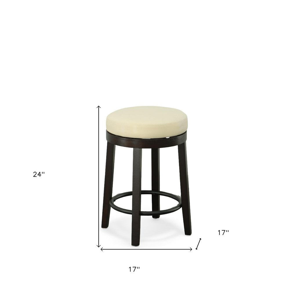 Set of Two 24 Cream and Espresso Faux Leather and Solid Wood Backless Counter Height Swivel Bar Chairs
