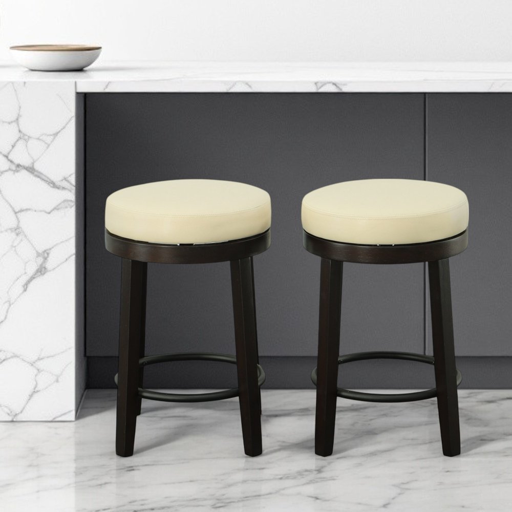 Set of Two 24 Cream and Espresso Faux Leather and Solid Wood Backless Counter Height Swivel Bar Chairs