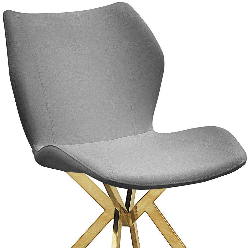 Set of Four Gray and Gold Faux Leather Dining Side Chairs