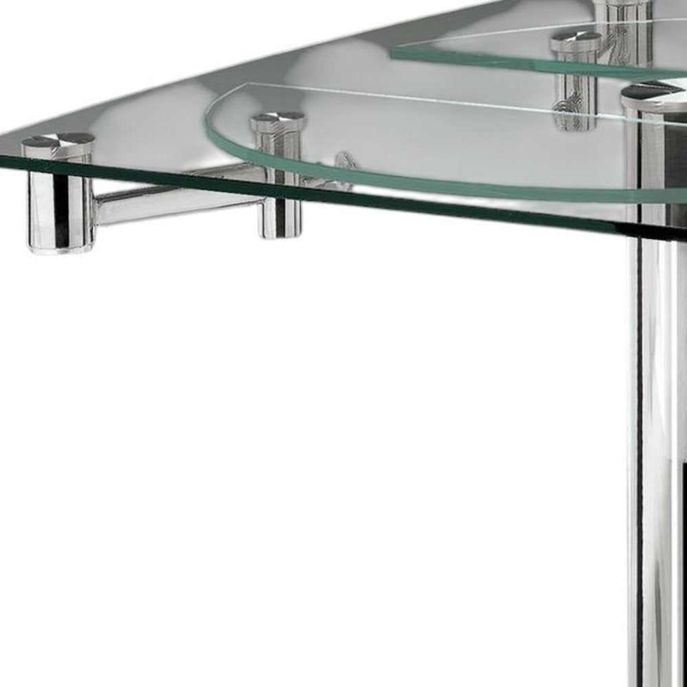 Clear and Silver Glass and Metal Self-Storing Leaf Motion Extendable Dining Table
