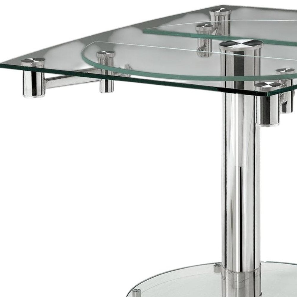 Clear and Silver Glass and Metal Self-Storing Leaf Motion Extendable Dining Table