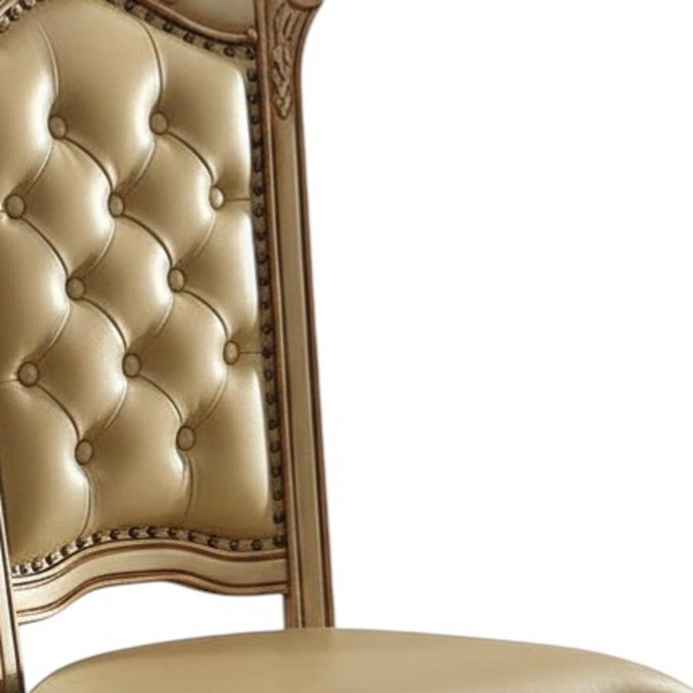 Set of Two Tufted Bone and Brass Upholstered Faux Leather and Wood Dining Side Chairs