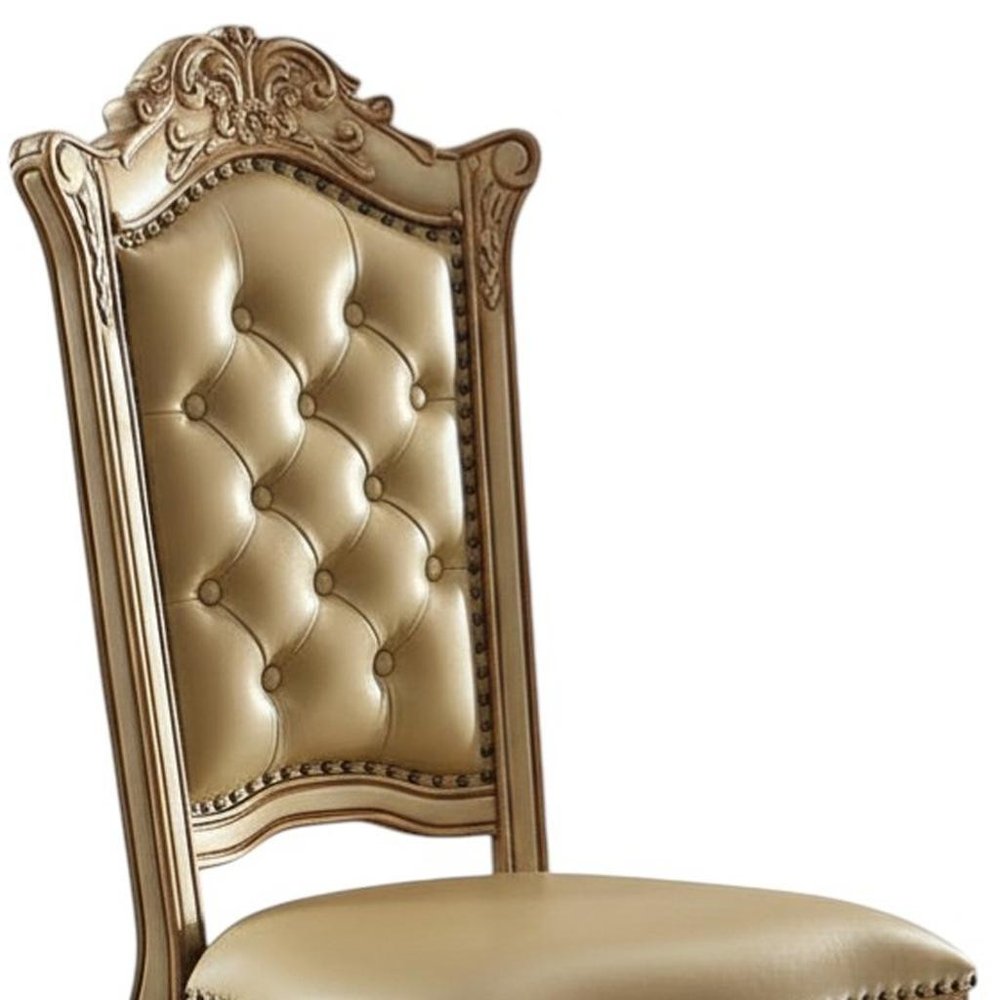 Set of Two Tufted Bone and Brass Upholstered Faux Leather and Wood Dining Side Chairs