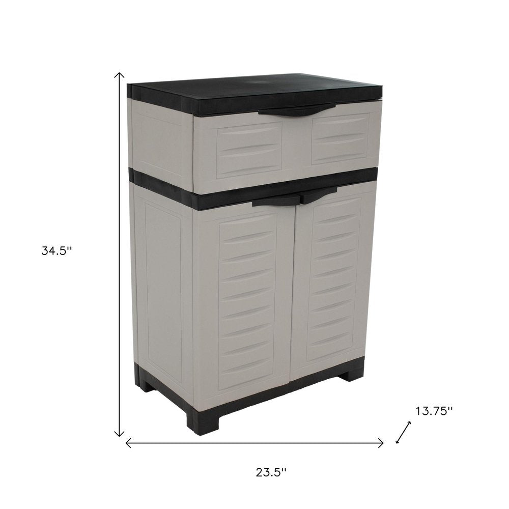 Gray Plastic Accent Cabinet with Two Doors and One Drawer - 24-inch