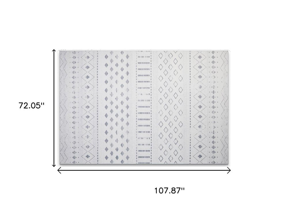 6' X 9' Ivory and Gray Geometric Distressed Area Rug
