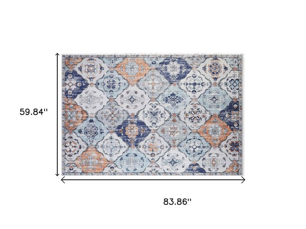 5' X 7' Ivory Navy Blue and Terra Cotta Quatrefoil Distressed Area Rug