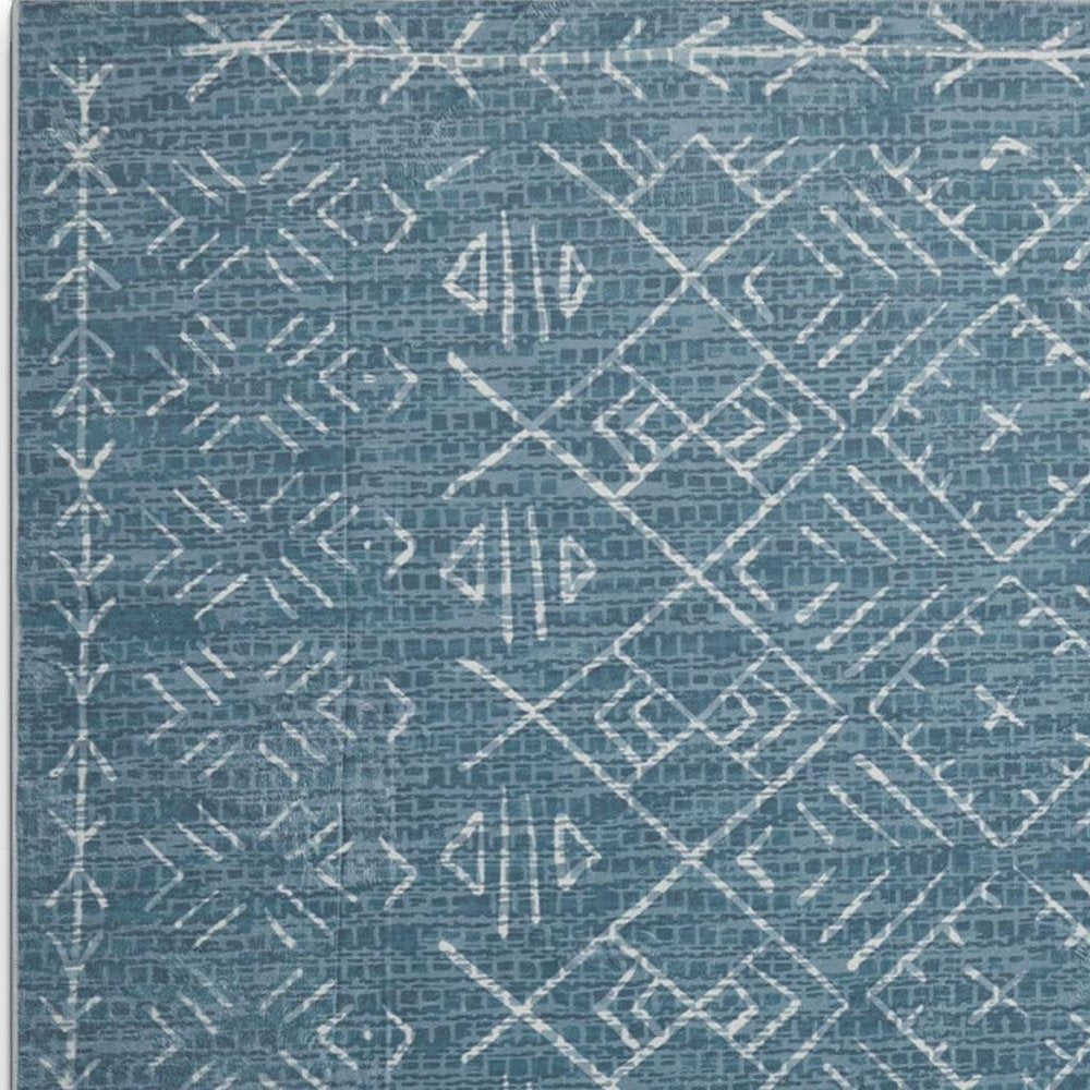 5' X 7' Teal and Off White Abstract Geometric Distressed Washable Area Rug