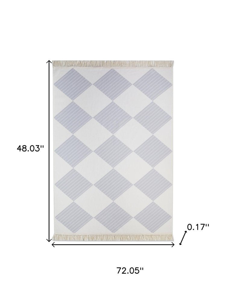 4' X 6' Lavender and Ivory Geometric Washable Area Rug with Fringe