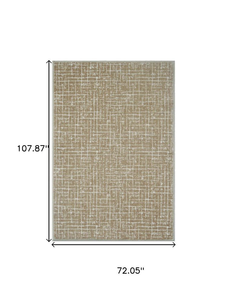 5' X 7' Gold and Ivory Abstract Geometric Distressed Washable Area Rug