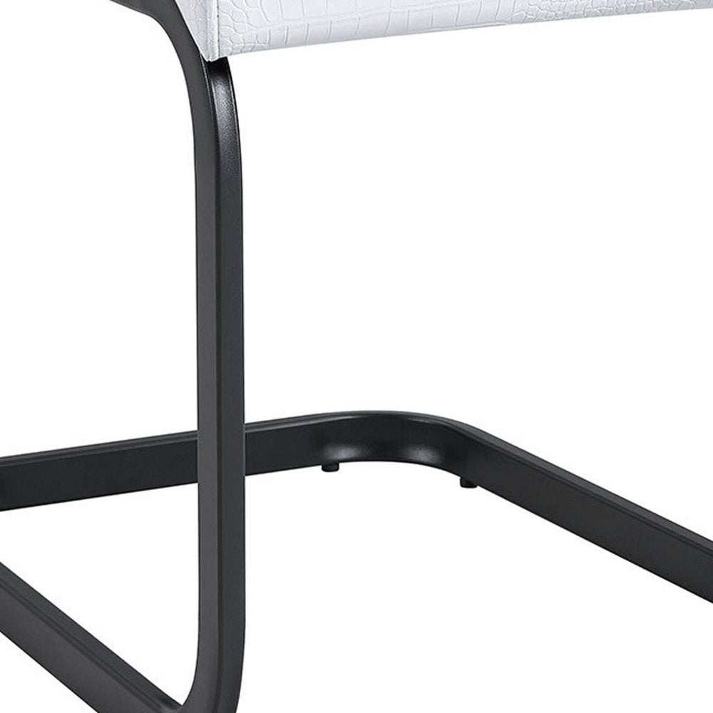 Set of Four White and Black Faux Leather Dining Side Chairs