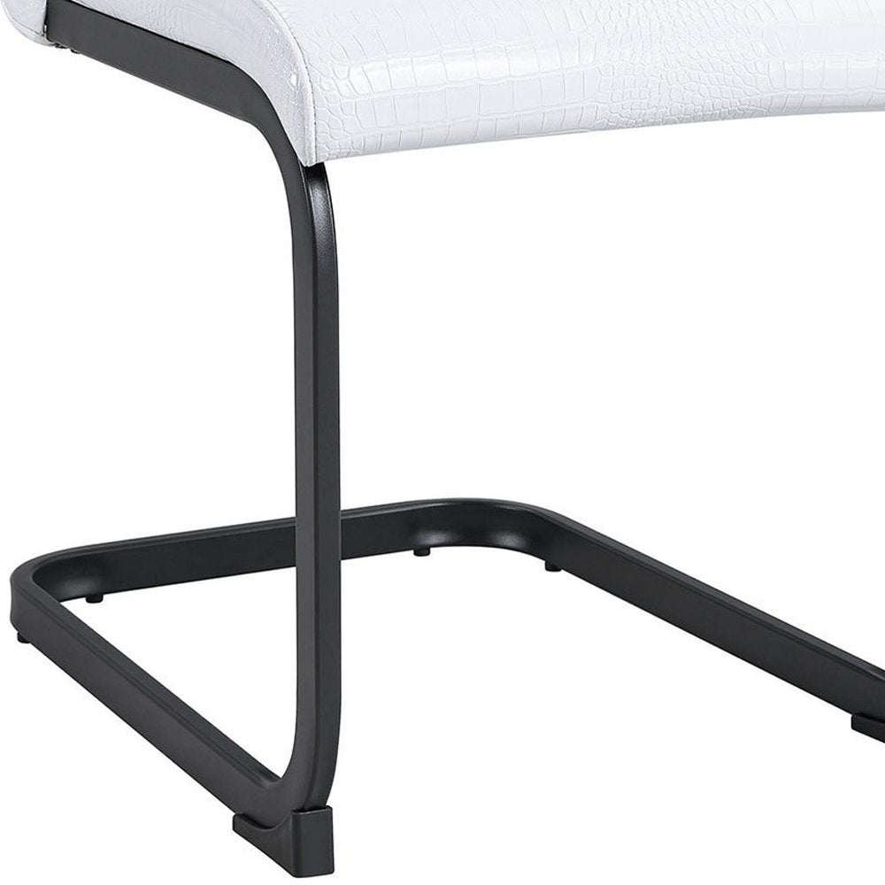 Set of Four White and Black Faux Leather Dining Side Chairs