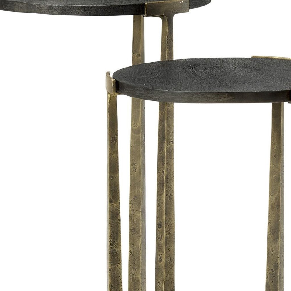 Set of Two Black and Antiqued Gold Distressed Solid Wood and Iron Round Cross Legs Nested Tables